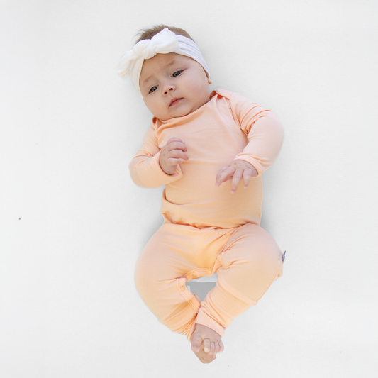 Infant Romper in Soft Peach